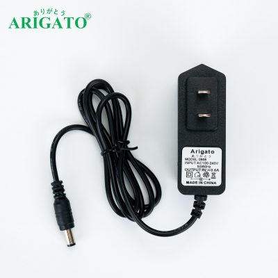 Adapter 9v0.6A Arigato (55*25)